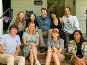 Southern Oral History Program interns sitting on steps at Love House